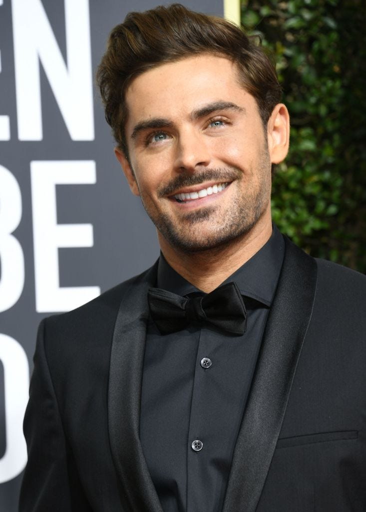 Hair, Facial hair, Suit, Beard, Hairstyle, Forehead, Eyebrow, White-collar worker, Chin, Formal wear, 