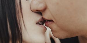 close up of middle eastern couple kissing