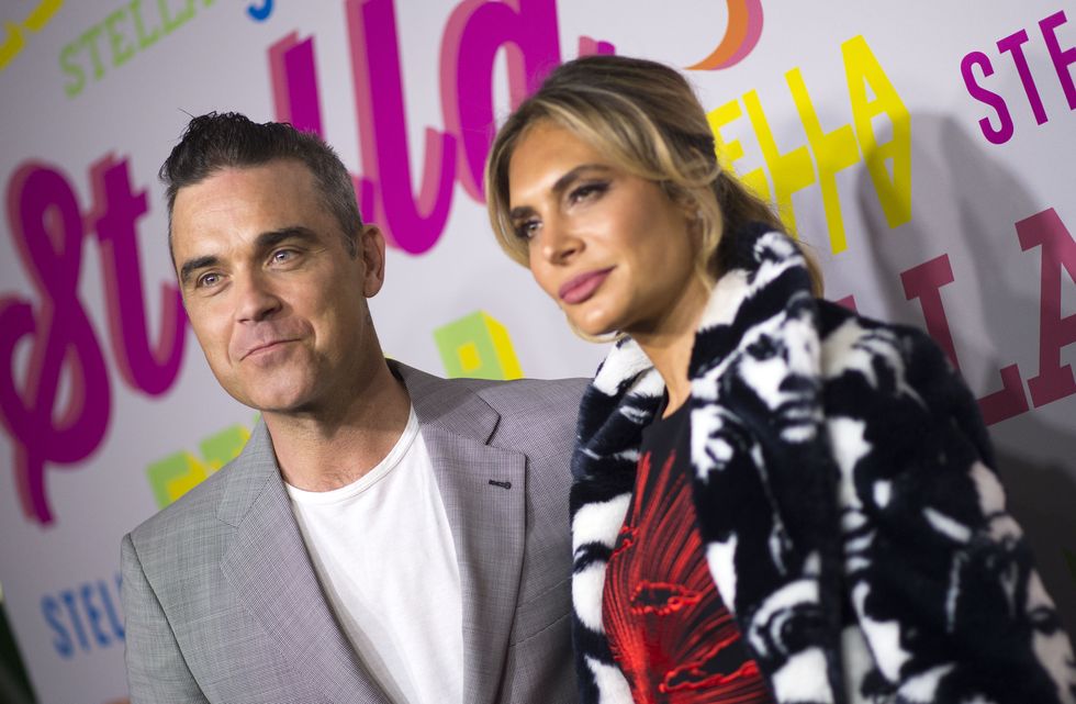 Simon Cowell says Robbie Williams and his wife are joining the X Factor judging panel