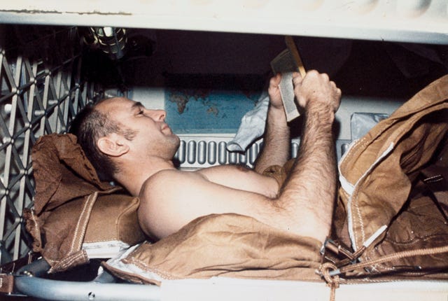 Skylab astronaut Alan Bean sleeping, 1973.