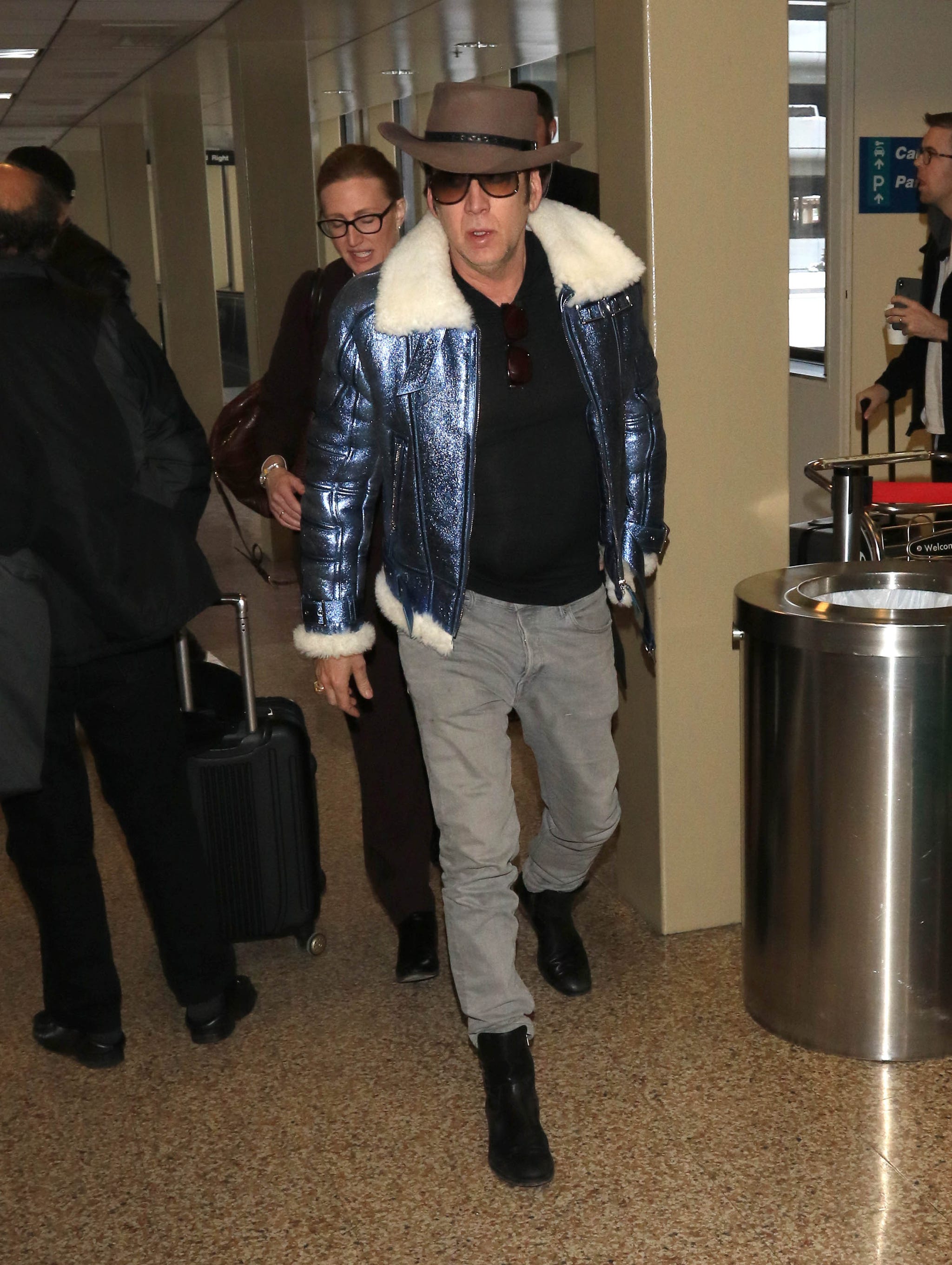 Behold Nicolas Cage: The Airport Style God From Outer Space