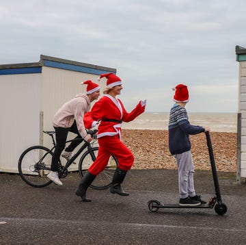 family fun on christmas day on worthing seafront, west sussex, england