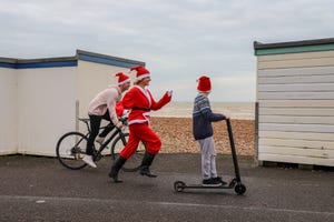 family fun on christmas day on worthing seafront, west sussex, england