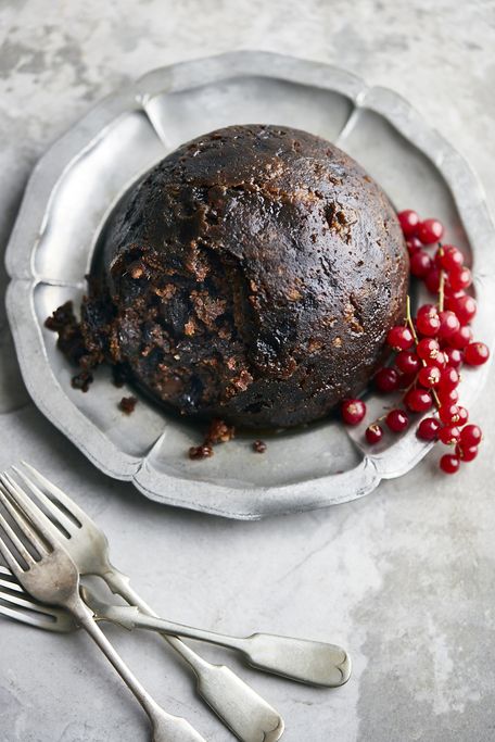 christmas pudding on silver plate, elevated view