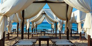 Tent, Furniture, Resort, Table, Vacation, Room, Architecture, Shade, Canopy, Building, 