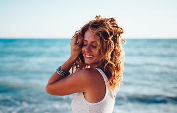 a woman with her arms crossed