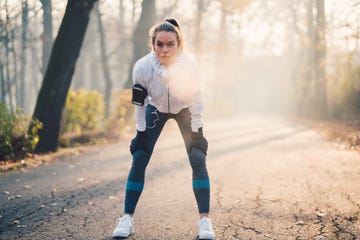 young woman breathing during workout