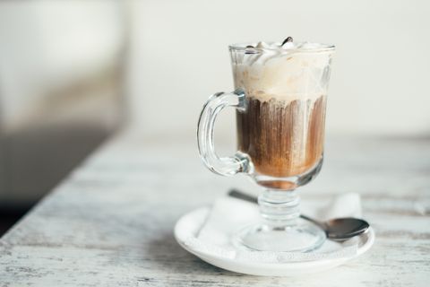 Close-up of an Irish coffee on a wooden table