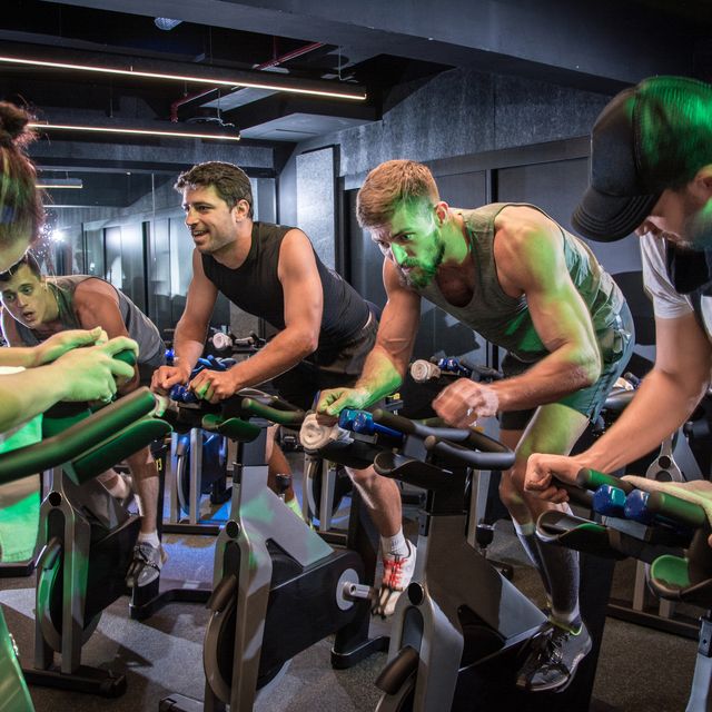 Indoor cycling, Green, Room, Muscle, Event, Leisure, Vehicle, Exercise, Recreation, Bicycle, 