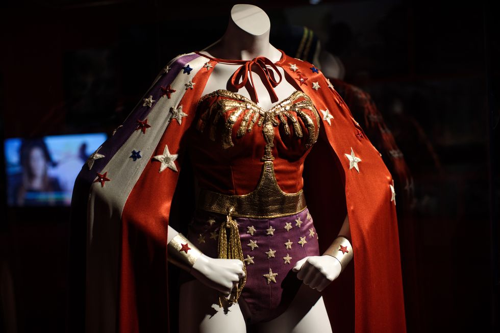 london, england   february 22 a wonder woman costume from the 1970s wonder woman series worn by lynda carter and designed by donald lee feld is on display at the dc comics exhibition dawn of super heroes at the o2 arena on february 22, 2018 in london, england the exhibition, which opens on february 23rd, features 45 original costumes, models and props used in dc comics productions including the batman, wonder woman and superman films photo by jack taylorgetty images