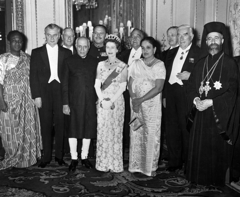 queen elizabeth ii with the prime ministers and heads of state attending the commonwealth prime ministers conference at the dinner party she gave at buckingham palace with the queen are l r dr kwame nkrumah ghana, john diefenbaker canada, dr hendrik verwoerd south africa, jawaharlal nehru india, field marshal muhammad ayub khan pakistan, sir roy welensky rhodesia and nyasaland, mrs sirimavo bandaranaike ceylon, harold macmillan britain, robert menzies australia and archbishop makarios cyprus photo by papa images via getty images