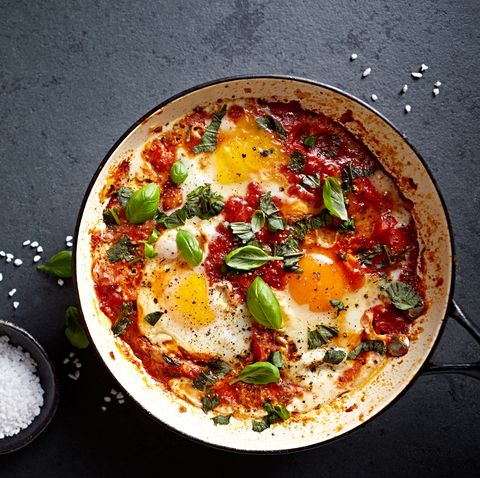 Shakshouka Eggs (poached eggs in a spicy tomato sauce)