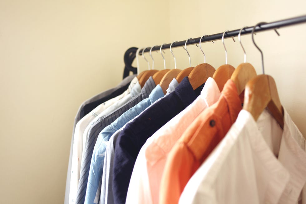 open wardrobe is usually adapted for a small living space the shirts, dresses or coats are hanged on a clothing rail, and some shelving at the bottom