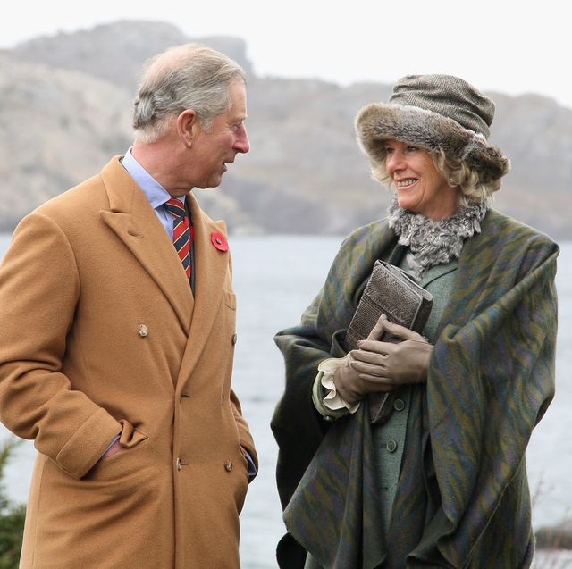 saint johns, nf   november 03 trh camilla, duchess of cornwall and prince charles, prince of wales pose for a photgraph as she visits the historic town of brigus on november 3, 2009 in saint johns, canada the royal couple are visiting canada from november 2 to november 12 and they will participate in commemorations and celebrations that honour canadas persons, places and events this is the prince of waless 15th visit to the country, however, it will be the duchess of cornwalls fist official visit to a country where she has strong ancestral links  photo by chris jacksongetty images