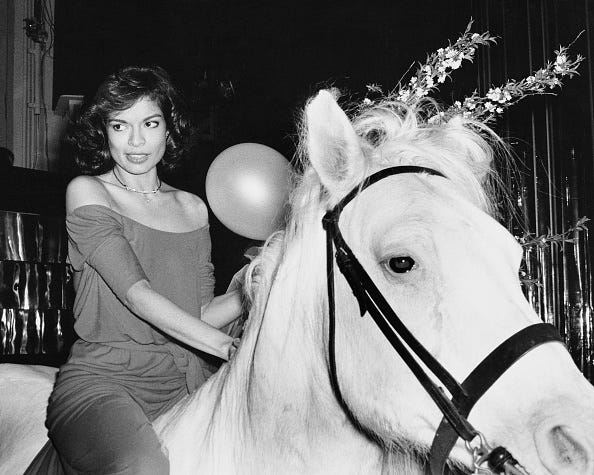 vintage birthday photos bianca jagger rides in on a white horse at during her birthday celebrations at studio 54 in new york, may 1977. (photo by rose hartman/getty images)
