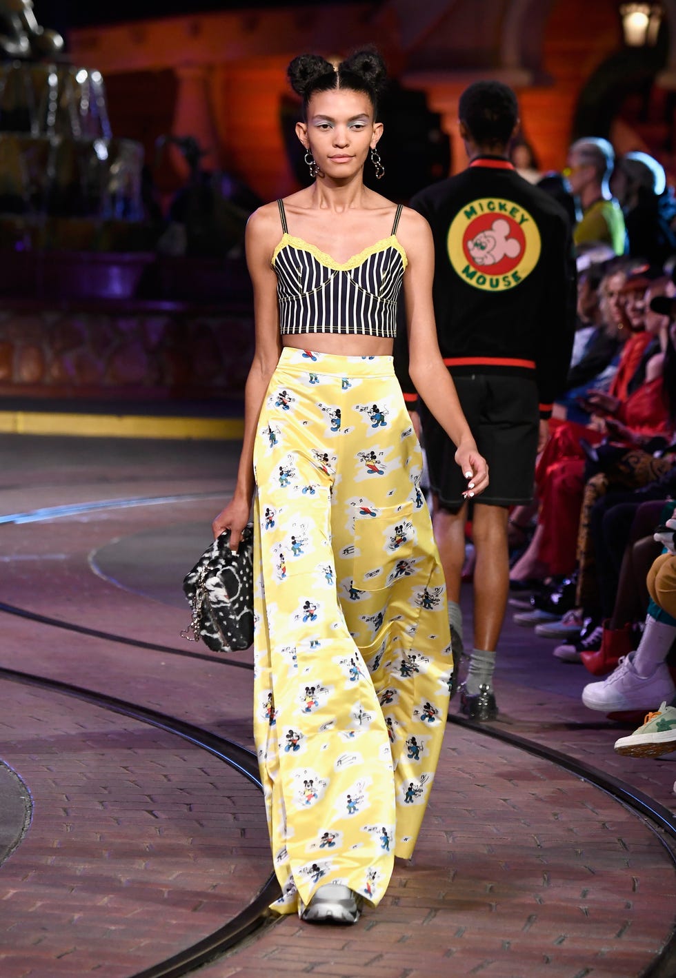 Footwear, Yellow, Style, Fashion show, Street fashion, Fashion, Runway, Fashion model, Public event, Waist, 