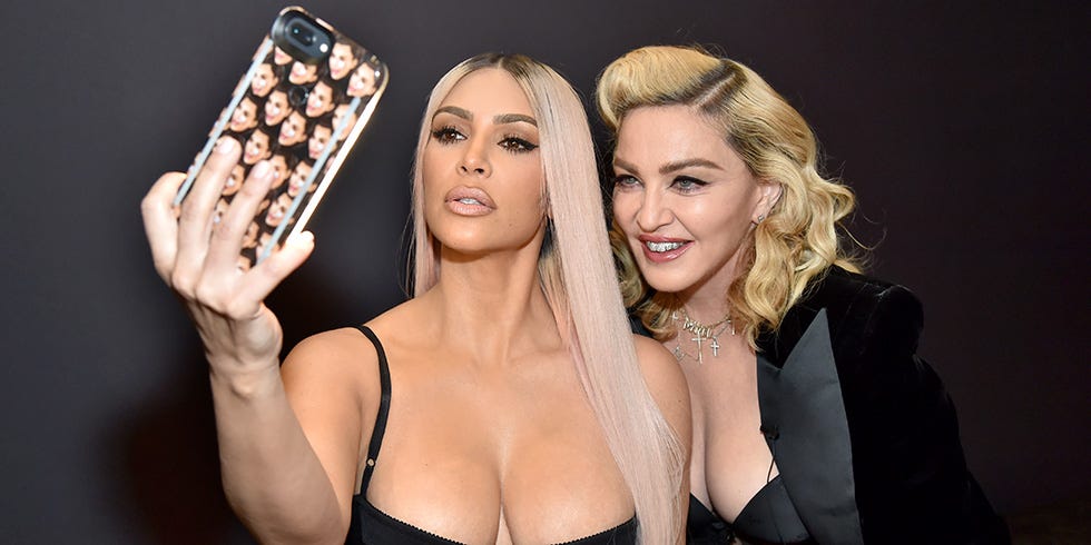 Kim Kardashian Channels Madonna in Teal Bra Top: Photos
