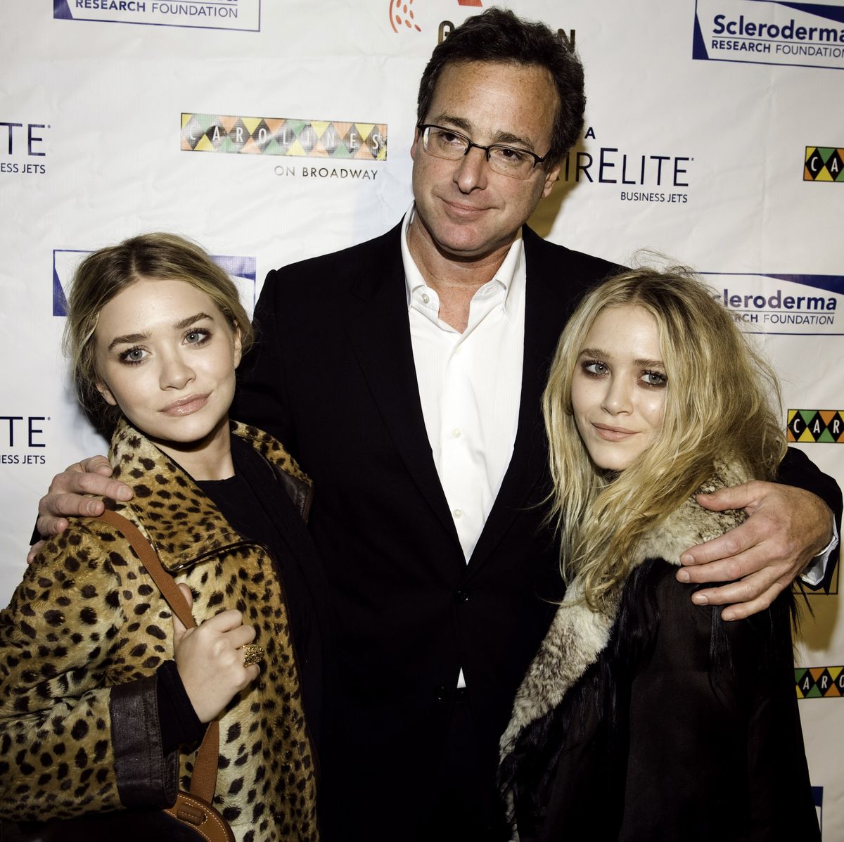 new york   november 09actress mary kate olsen, comedian bob saget and ashley olsen attend cool comedy hot cuisine 2009 benefiting the scleroderma research foundation at carolines on broadway on november 9, 2009 in new york city  photo by shawn ehlerswireimage for scleroderma research foundation