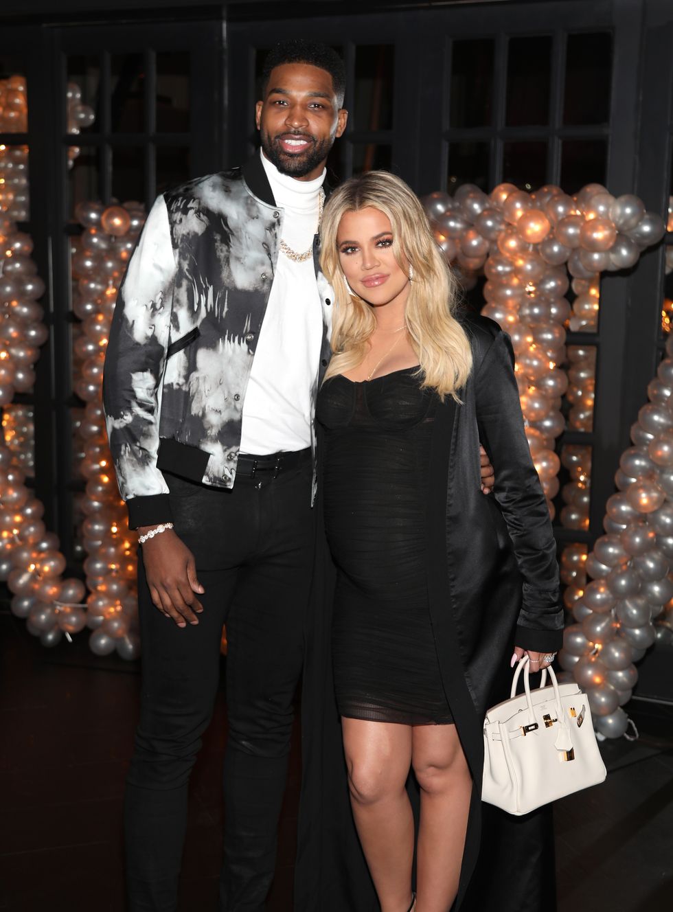 los angeles, ca march 10 tristan thompson and khloe kardashian pose for a photo as remy martin celebrates tristan thompsons birthday at beauty essex on march 10, 2018 in los angeles, california photo by jerritt clarkgetty images for remy martin