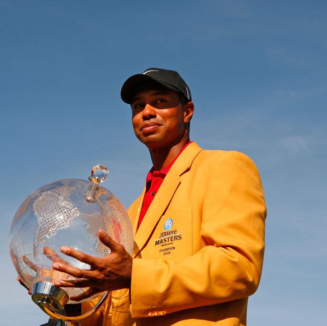 melbourne, australia   november 15  tiger woods of the usa poses with the trophy after the final round of the 2009 australian masters at kingston heath golf club on november 15, 2009 in melbourne, australia  photo by scott barbourgetty images