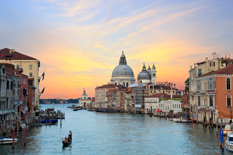 most beautiful and visited view from accademia bridge on grand canal in venice, venice is the major tourist destination in italy, always crowded with tourist and visitors image taken at sunset with my canon 6d on jun 2016