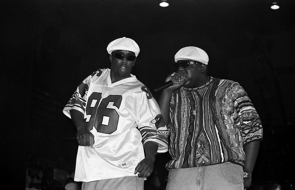 chicago   april 1995  rappers sean puffy combs and notorious big, performs at the international amphitheatre in chicago, illinois in april 1995  photo by raymond boydgetty images
