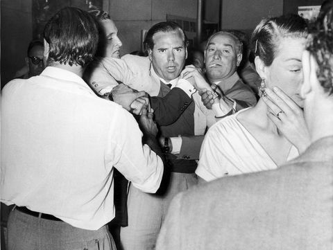 kevin mcclory, film producer, being restrained in bar room brawl with london film critic leonard mosley, who gave a very negative review of his film 'the boy on the bridge', venice film festival, september 1959 photo by frank charmanmirrorpixgetty images