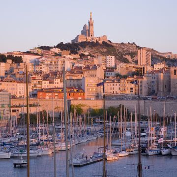 capital of the bouches du rhone departement, marseille is frances second city and largest commercial port dominating its skyline is the 19th century basilica of notre dame de la garde, which offers a panoramic view of the vieux port and mediterranean