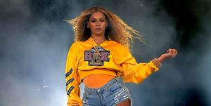 beyonce on stage coachella yellow jumper nails