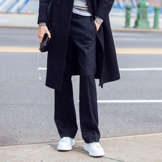 new york, ny february 12 model ana arto wears a deveaux coat, gray top, black trouses, and white sneakers on february 12, 2018 in new york city photo by melodie jenggetty images