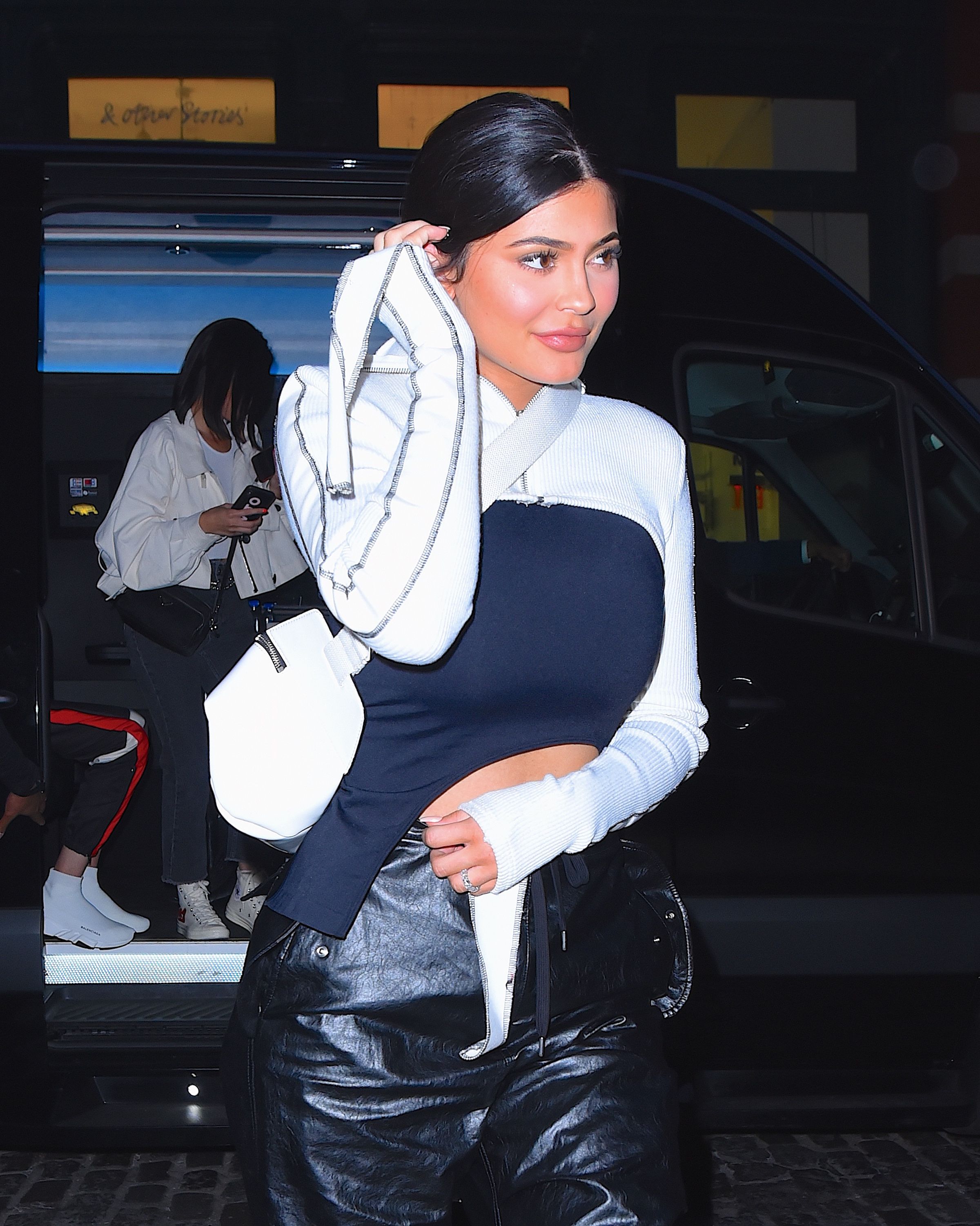 Kylie Jenner in black fishnet sock boots in NYC on May 5 ~ I want her style  - What celebrities wore and where to buy it. Celebrity Style
