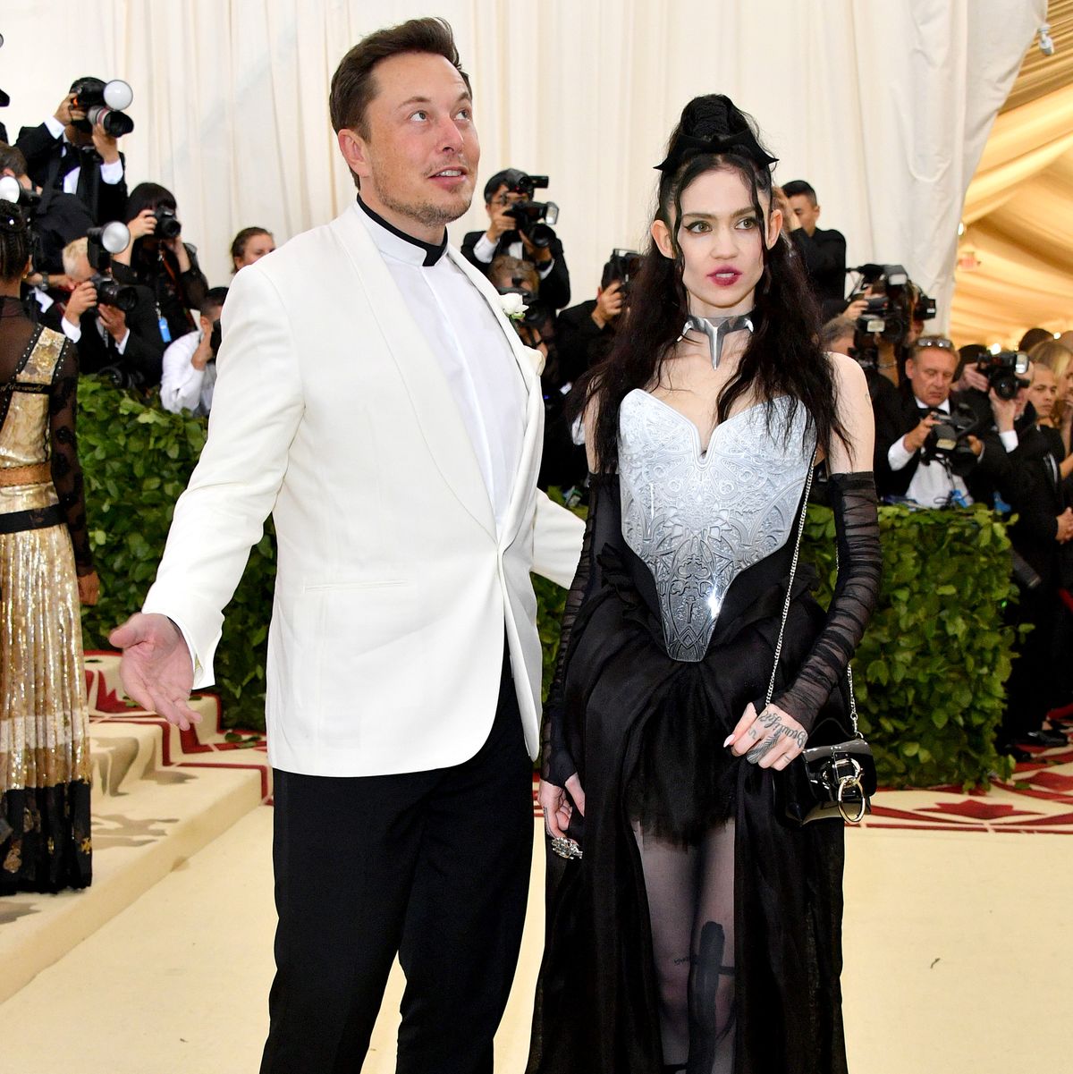 new york, ny   may 07  elon musk and grimes attend the heavenly bodies fashion  the catholic imagination costume institute gala at the metropolitan museum of art on may 7, 2018 in new york city  photo by dia dipasupilwireimage