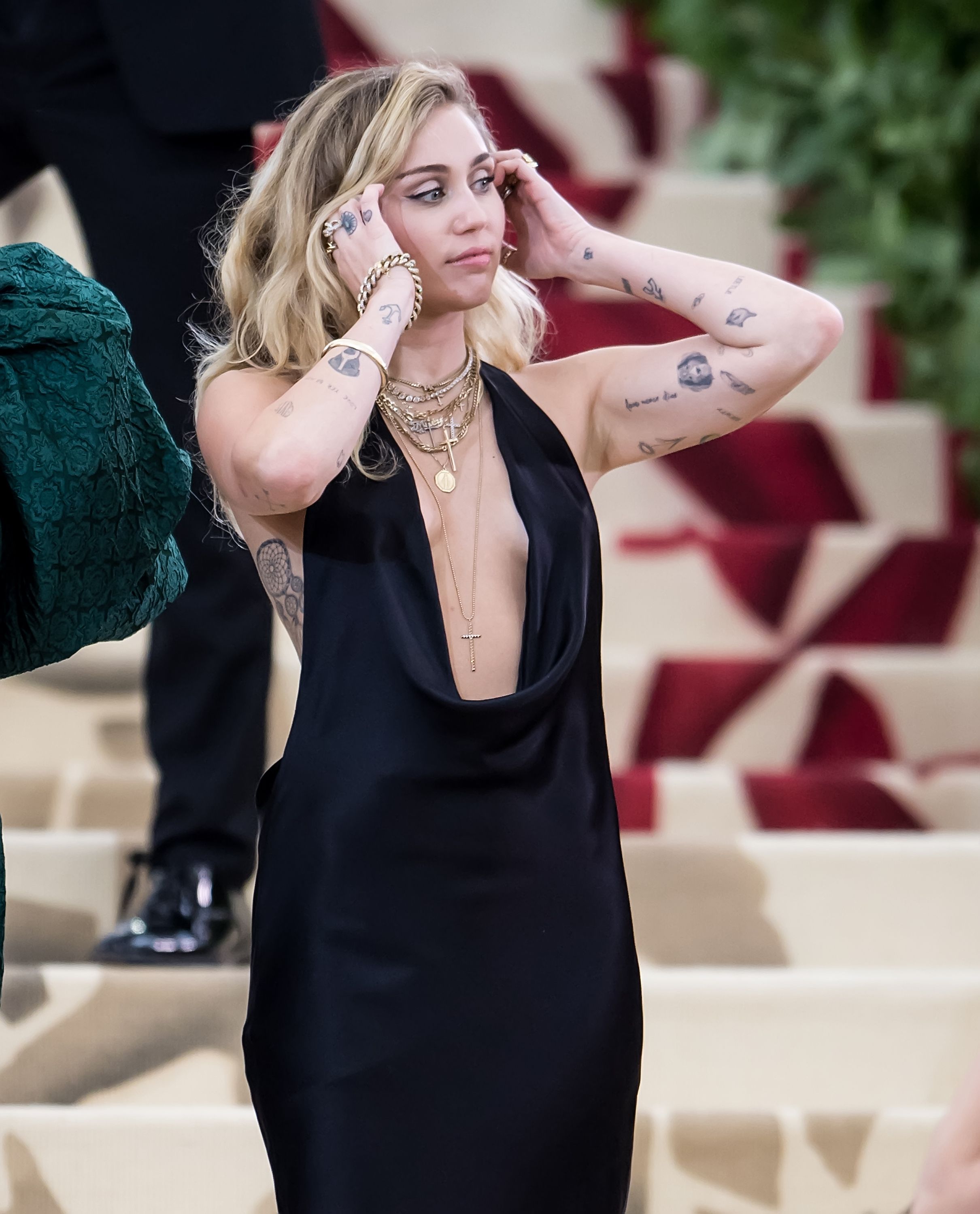 Internet Genuinely Surprised Impressed by Miley Cyruss New Teddy  Roosevelt Tattoo  Vanity Fair