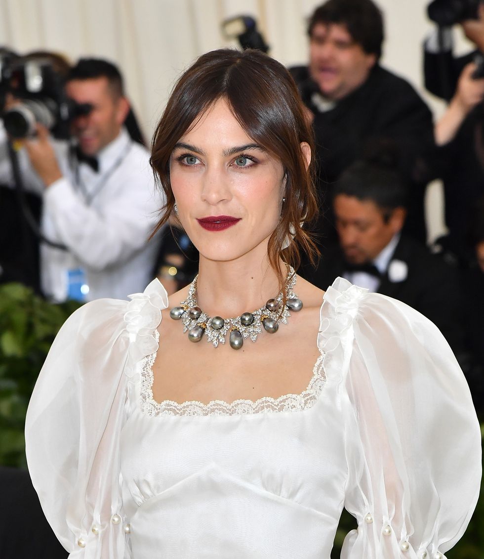 alexa chung arrives for the 2018 met gala on may 7, 2018, at the metropolitan museum of art in new york   the gala raises money for the metropolitan museum of arts costume institute the galas 2018 theme is heavenly bodies fashion and the catholic imagination photo by angela weiss  afp        photo credit should read angela weissafp via getty images
