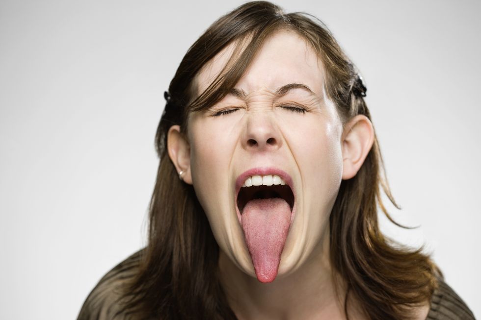 Tongue, Face, Shout, Facial expression, Yawn, Mouth, Organ, Nose, Skin, Cheek, 
