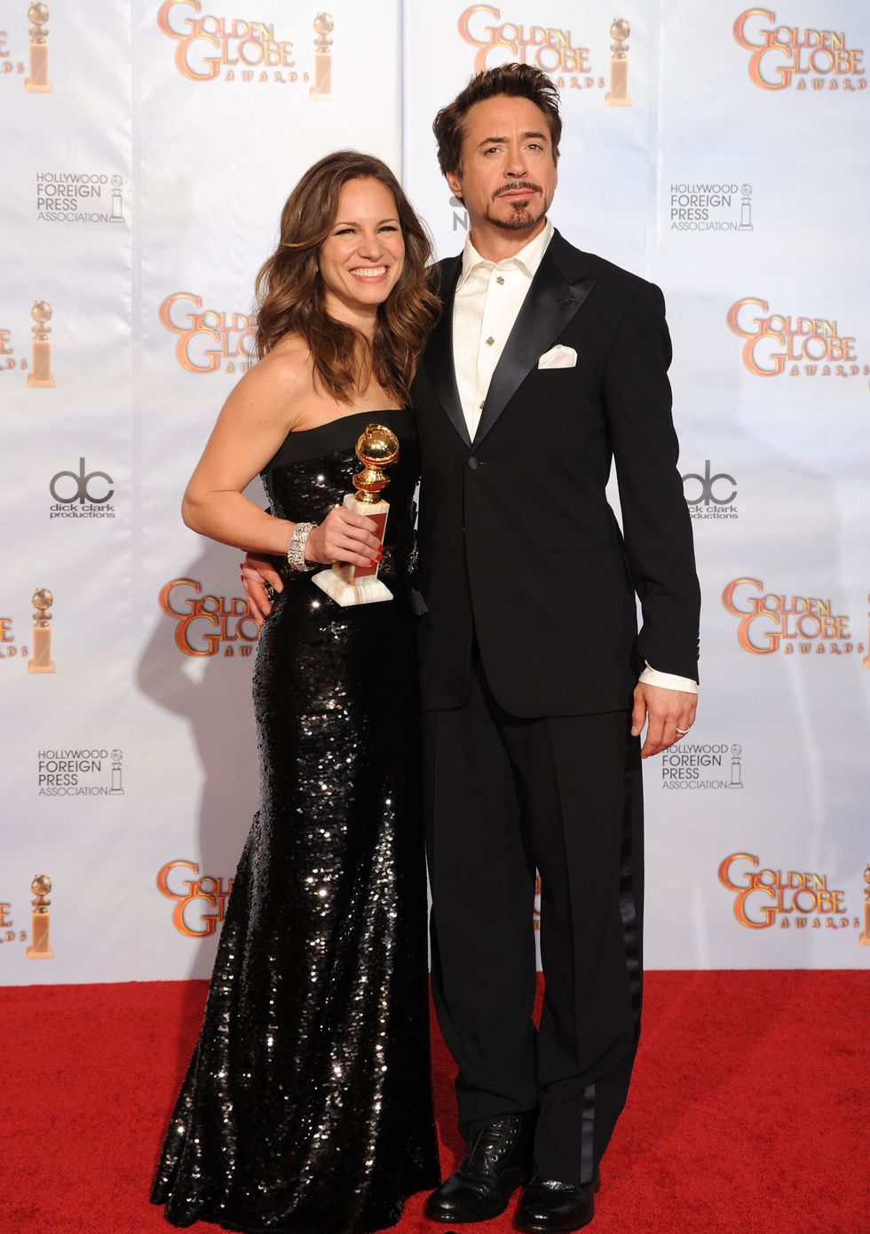 beverly hills, ca january 17 actor robert downey, jr r and his wife susan with the best performance by an actor in a motion picture comedy or musical award for sherlock holmes in the press room at the 67th annual golden globe awards held at the beverly hilton hotel on january 17, 2010 in beverly hills, california photo by kevin wintergetty images