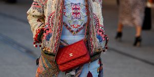 Street fashion, Clothing, Fashion, Red, Joint, Outerwear, Textile, Shoulder, Dress, Costume, 