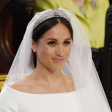 Bride, Bridal veil, Bridal accessory, Photograph, Veil, Facial expression, Headpiece, Hair accessory, Skin, Beauty, 