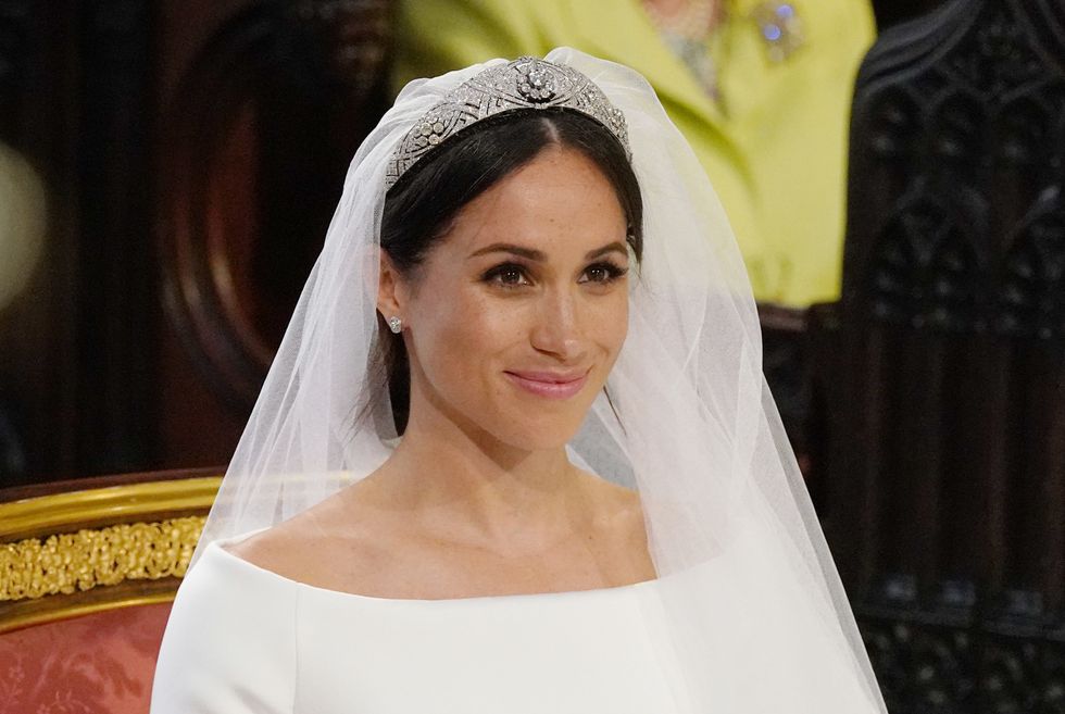 topshot   us fiancee of britains prince harry, meghan markle arrives at the high altar for their wedding ceremony in st georges chapel, windsor castle, in windsor, on may 19, 2018 photo by jonathan brady  pool  afp        photo credit should read jonathan bradyafp via getty images