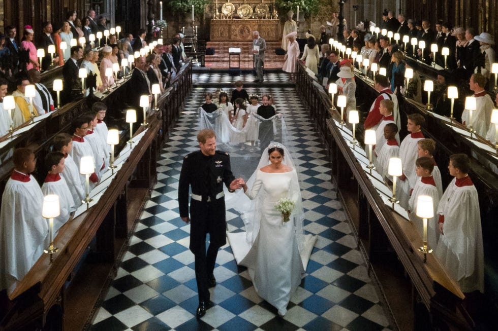 Meghan Markle holding bridal bouquet at royal wedding