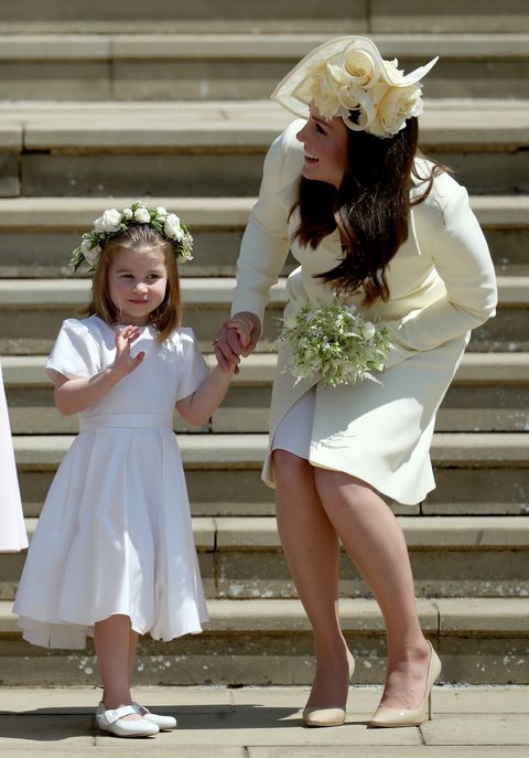 WINDSOR, UNITED KINGDOM Charlotte, Duchess of Cambridge stands on the steps with Duchess of Cambridge, Catherine, after the wedding of Prince Harry and Meghan Markle at St George's Chapel, Windsor Castle, England, 19 May 2018 Princess (19 May 2018, Windsor, UK) Jane Barlow wpa poolgetty image