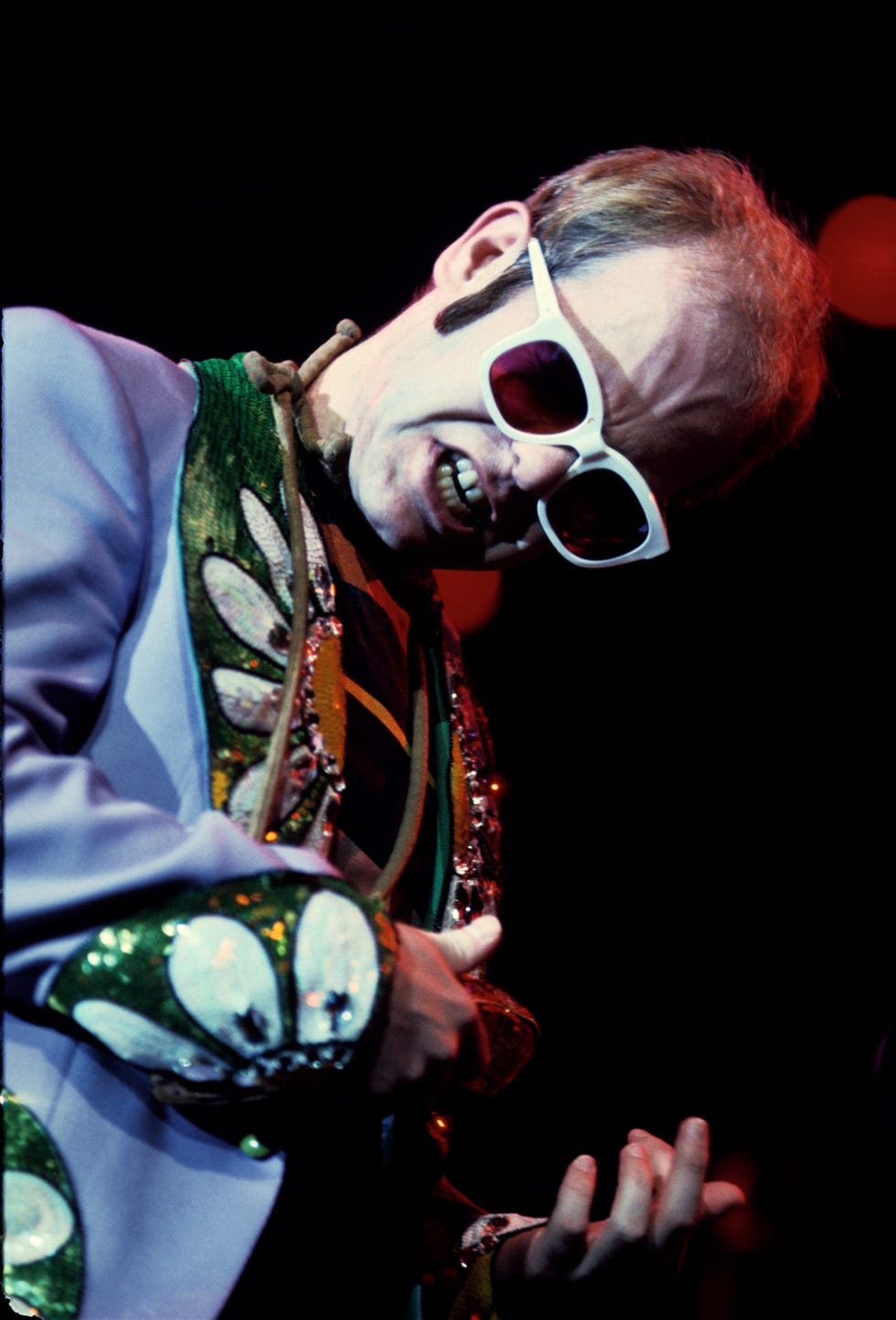 Elton John Sunglasses Photos - 50 Years of Elton John's Fabulously