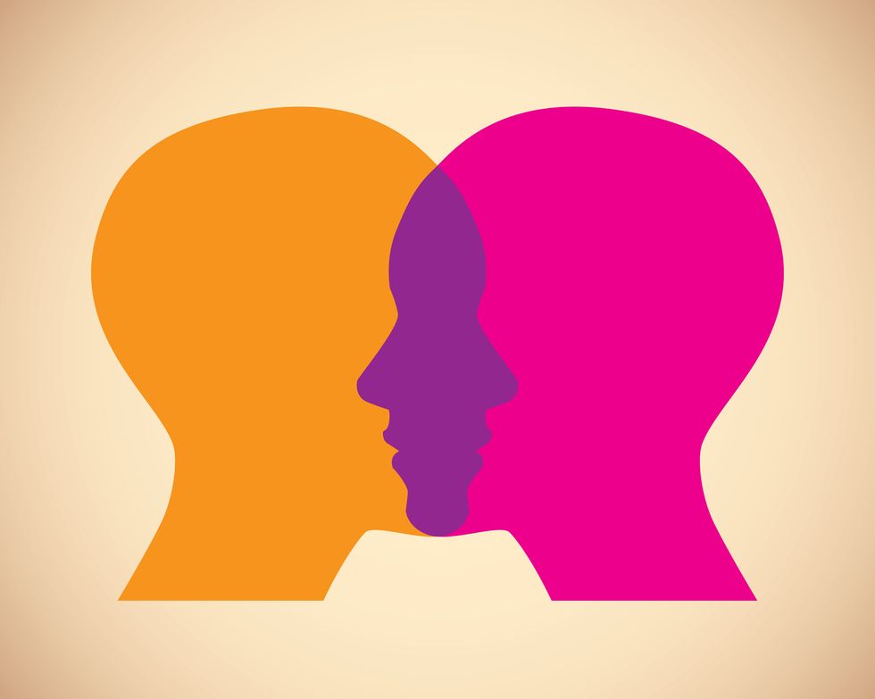 vector illustration of two orange and pink womens faces against a tan background in flat style