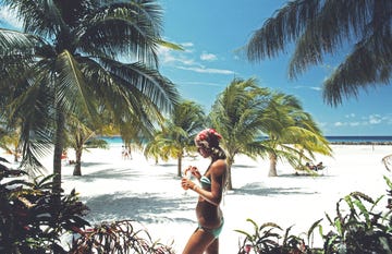 slim aarons photo girl on beach