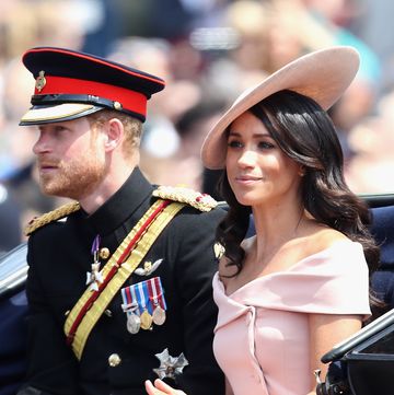 london, england june 09 meghan, duchess of sussex and prince harry, duke of sussex during trooping the colour on the mall on june 9, 2018 in london, england the annual ceremony involving over 1400 guardsmen and cavalry, is believed to have first been performed during the reign of king charles ii the parade marks the official birthday of the sovereign, even though the queens actual birthday is on april 21st photo by chris jacksongetty images