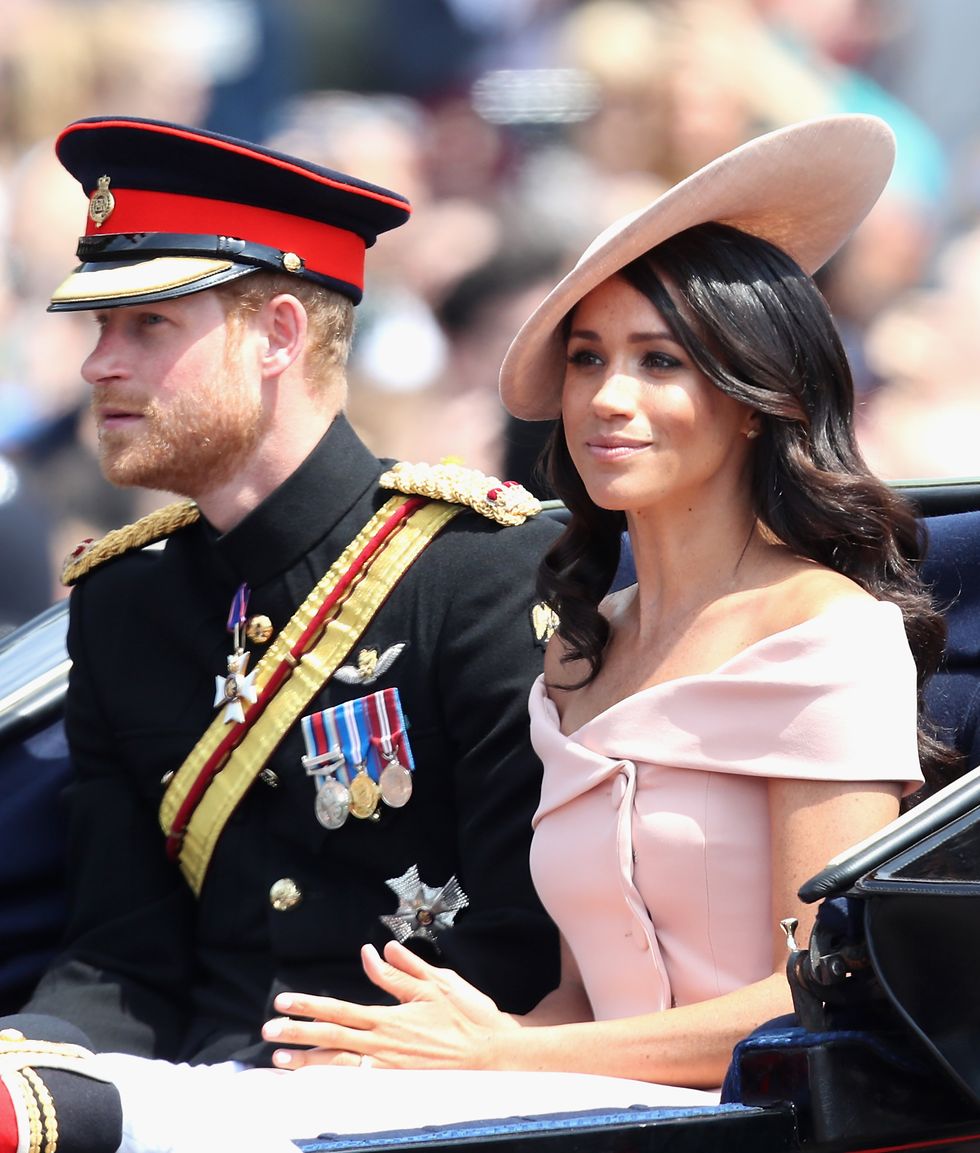 london, england june 09 meghan, duchess of sussex and prince harry, duke of sussex during trooping the colour on the mall on june 9, 2018 in london, england the annual ceremony involving over 1400 guardsmen and cavalry, is believed to have first been performed during the reign of king charles ii the parade marks the official birthday of the sovereign, even though the queens actual birthday is on april 21st photo by chris jacksongetty images