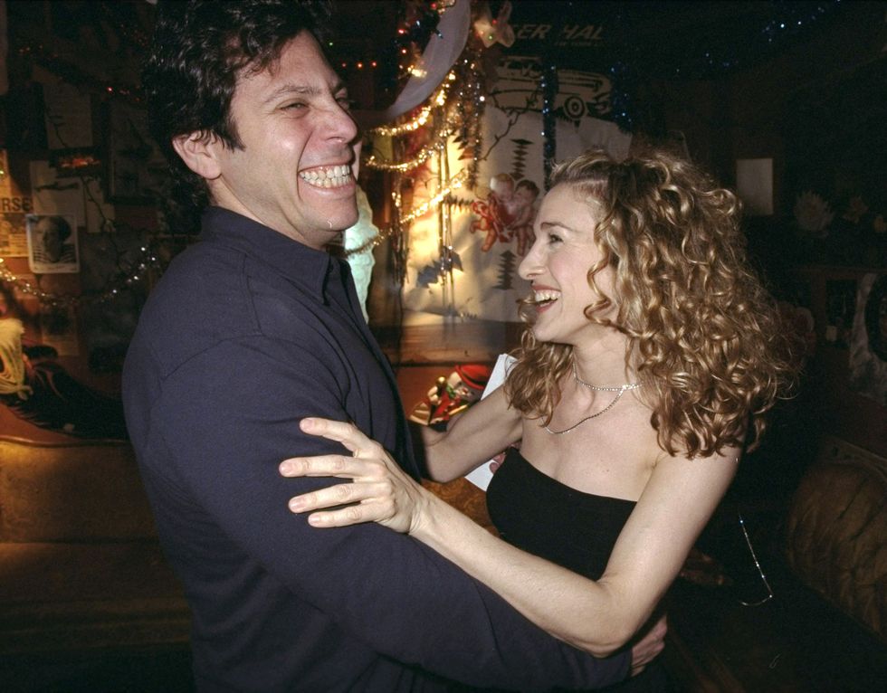 united states march 12 sarah jessica parker shares a laugh with shows darren star at webster hall where hbo was filming its new comedy series sex and the city the show, written by star, is scheduled to debut in june photo by richard corkeryny daily news archive via getty images