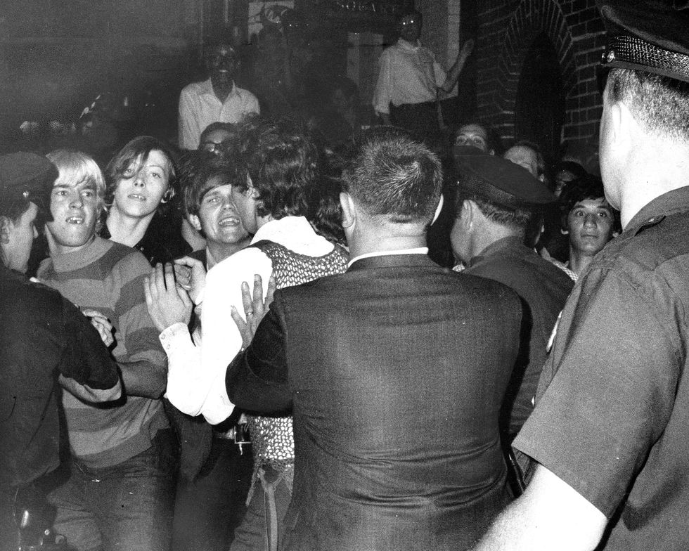 united states   june 28  stonewall inn nightclub raid crowd attempts to impede police arrests outside the stonewall inn on christopher street in greenwich village  photo by ny daily news archive via getty images