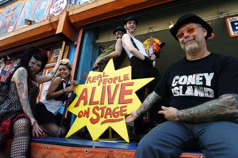 united states   june 22  dick zigun right, founder of the coney island circus sideshow, is joined by sideshow performers insectavora, heather holiday, rock rocket, and diamond donny v l to r outside the sideshow on surf ave in coney island  photo by linda rosierny daily news archive via getty images