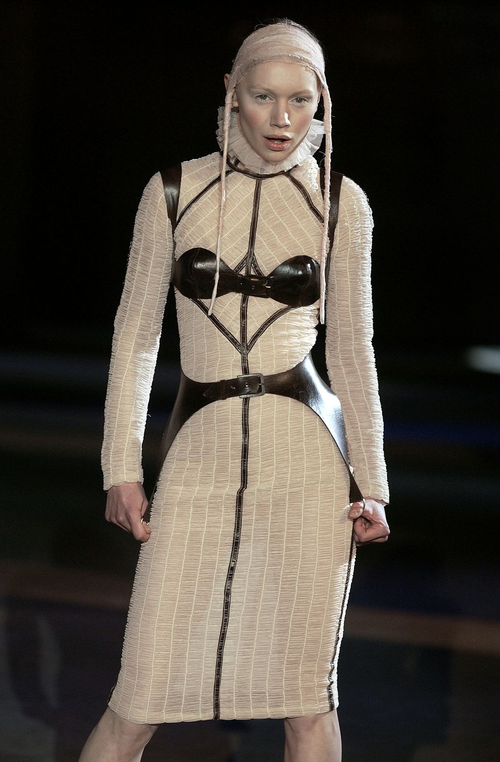 paris   march 11 uk out a model walks the runway during the alexander mcqueen ready to wear autumnwinter 200203 collection show part of paris fashion week on march 11,2002 in paris,france photo by catwalkinggetty images